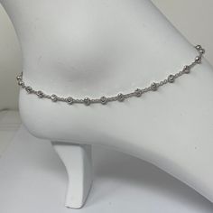 "Italy Stamped 925 Sterling Silver Anklet, Rhodium plated Minimalist Anklet, White gold Finish 3 mm Moon Cut Bead Anklet, Anklet Gift For Her ------------------------------------- Details Length : 9\"+1\" , 10\"+1\" Material : Solid Italy Stamped 925 sterling silver Chain Style : Diamond Cut Cable Chain Closure : Lobster Clasp Weight: About - 3.7 gram ------------------------------------- Do Visit our Shop for more jewelry: https://www.etsy.com/shop/InsiaJewelry --------------------------------- Painjan Designs Silver Simple, Silver Anklets Designs Latest Silver Anklet Designs, Anklet Jewelry Silver, Payal Designs Silver Aesthetic, Elegant Adjustable Anklets With Silver Beads, Elegant Silver Anklets With Tiny Beads, Elegant Silver Anklets With Round Beads, Painjan Designs Silver, Anklets Indian Silver Modern