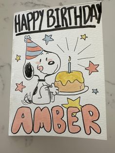 a happy birthday card with a cartoon character holding a cake