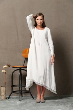 Cool and comfortable for hot summer days, this natural linen and white lagenlook dress is elegant and stylish. It is a wonderful wardrobe staple that's a timeless classic you'll wear again and again. Welcome to my shop and thanks for your interested to the white linen dress. this is a loose White Lagenlook Dress,The White Lagenlook Dress has a litter see through, but most customer said it can accept. if you want a lining, you can contact us, we can add a white cotton lining for you. the tiny fol White Bohemian Linen Dress Made Of Ramie, White Bohemian Ramie Linen Dress, Bohemian Asymmetrical White Dresses, Spring Beach Linen Dress With Asymmetrical Hem, Flowy White Linen Dress For Spring, White Flowy Linen Dress For Spring, White Lagenlook Dress With Asymmetrical Hem, White Relaxed Fit Lagenlook Dress, Summer Linen Lagenlook Dress With Asymmetrical Hem