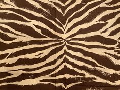 a zebra print fabric with brown and white stripes