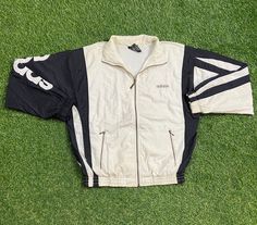 Vintage Adidas Jacket Good Vintage Condition Made in Taiwan Each Vintage item is unique and fits differently. Please refer to measurements for the best fit.  Size Small  Width 23 in  Length 26 in * I ship all items in two or three business days and utilize Priority Mail options via USPS. Expedited shipping is available upon request. If you have any questions; Please Ask! *I Ship International!! PLEASE EMAIL BEFORE PURCHASING INTERNATIONALLY * All of my items are pre-owned and, unfortunately, som Light Rain Jacket, Adidas Windbreaker, Adidas Vintage, Tracksuit Jacket, Light Rain, All Sports, Vintage Adidas, Workout Jacket, Athletic Wear