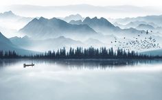 a boat floating on top of a lake surrounded by mountains and birds in the sky