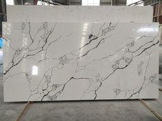 a large white marble slab in a warehouse