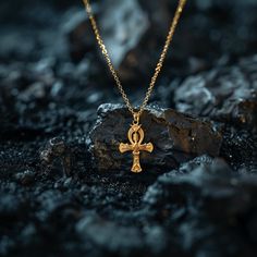 This solid gold key of Ankh necklace showcases exquisite craftsmanship, symbolizing life and spirituality. The key of Ankh pendant is more than just jewelry; it's a fine representation of ancient Egyptian elegance and the timeless allure of this sacred symbol. PENDANT INFORMATIONThis pendant is made of real, solid gold.• Made in USA• Material: 14k or 18k solid gold• Finish: polished• Height: 1.5" (38,5 mm) x Width: 0.95" (24 mm)• Pendant weight: approx. 5 grams (14k)• Bail: fits up to 4 mm chain Gold Plated Cross Pendant Necklace With Spiritual Style, Gold Plated Cross Pendant Necklace Spiritual Style, Spiritual Gold Plated Cross Pendant Necklace, Amulet Style Ankh Necklace In Brass, Symbolic Ankh Brass Necklace, Bronze Crucifix Necklace As Gift, Spiritual Brass Crucifix Jewelry, Bronze Crucifix Necklace For Gift, Traditional Gold Crucifix Jewelry