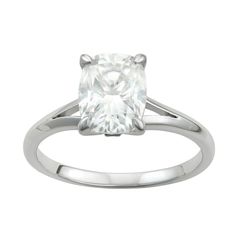 a cushion cut diamond engagement ring in white gold