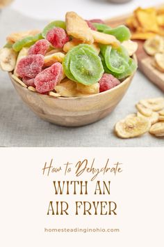 a wooden bowl filled with fruit sitting on top of a table next to sliced bananas