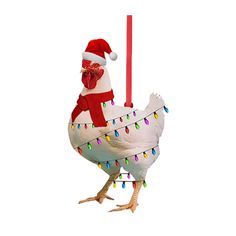 a chicken with a santa hat and lights hanging from it's back