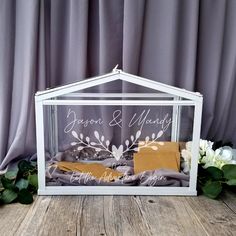 a clear acrylic frame with the words mr and mrs madison printed on it