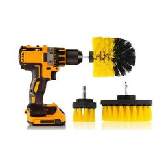 a drill and brush on a white background