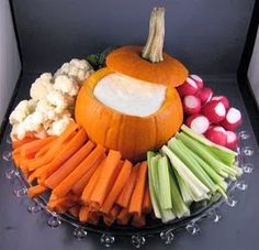 a platter filled with carrots, celery and cauliflower