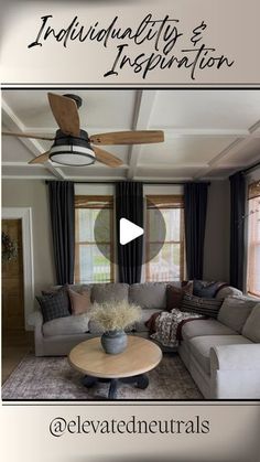 a living room with couches and a ceiling fan in the middle of the room