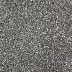 the texture of an old carpet is gray