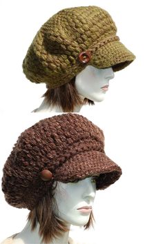 two hats on mannequin heads with buttons