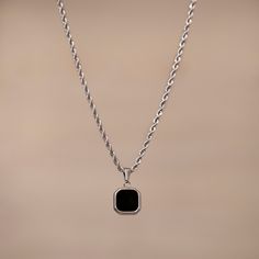 Enjoy our photo gallery. Real customers like you. Real customer satisfaction!  Inspired by the classy look of Hollywood actors,  our pendant necklaces are the perfect solo piece to add some style to your look or layer it with any of our other pendant necklaces. You'll definitely catch complements from someone with this around your neck!   Our Onyx pendants are available in both 18K Gold and 18K Silver.  ▼ Details & Specifications ▼ ♚ Chain Length: 53cm ♚ Chain Width: 2mm ♚ Chain Style: Micro-cur Minimalist Black Necklace For Formal Events, Minimalist Black Necklace For Formal Occasions, Formal Black Jewelry With Silver Chain, Black Sterling Silver Necklace, Classic Black Jewelry For Everyday, Black Round Pendant Necklace For Everyday, Classic Black Necklaces With Round Pendant, Black Necklace With Silver Chain For Gift, Modern Black Jewelry With Silver Chain