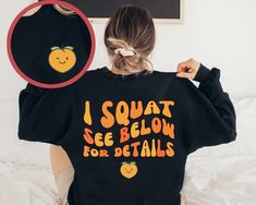 "Looking for a stylish and comfortable sweatshirt that shows off your love of fitness and weightlifting? Look no further than this \"I Squat- See Below for Details\" sweatshirt! This cute and funny workout hoodie is perfect for women who want to look and feel great while they lift, with a comfortable fit and eye-catching design that's sure to turn heads. Whether you're hitting the gym or running errands, this weightlifting hoodie is a must-have addition to your wardrobe. So why wait? Order your \"I Squat- See Below for Details\" sweatshirt today and start showing off your passion for fitness in style! ** Sweatshirts are Unisex sizing. Women should order a size smaller and men a size larger than their typical sizes unless a relaxed fit is desired. Please review the shirt measurements in the Graphic Print Sweatshirt For Workout During Sports Season, Graphic Print Sweatshirt For Workout And Sports Season, Workout Sweatshirt With Graphic Print, Relaxed Fit, Graphic Print Sweatshirt For Sports Season Workout, Graphic Print Sweatshirt For Sports Season, Athleisure Gym Sweatshirt With Graphic Print, Graphic Print Crew Neck Hoodie For Gym, Moisture-wicking Relaxed Fit Sweatshirt For Gym, Casual Crew Neck Sweatshirt For Training