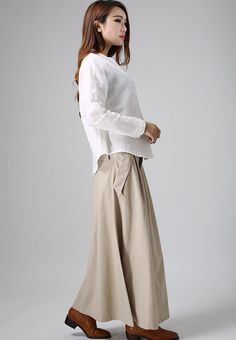 "A casual women skirts in Khaki, If you're looking for a long skirt made by linen , this pleated front and flap detail skirt will be your choice . * Details * * Soft Linen fabric * Hide zipper in the front side * Pleated on the waist * Twin side pockets with Flap detail * Back flap detail with no pocket . * More color and More size https://www.etsy.com/listing/195905616 NOTE Please leave us your body measurement When you Place an order, they will help us check the size and ship your package. Wai Relaxed Fit Long Maxi Skirt, Baggy Pleated Maxi Skirt, Casual Linen Lined Maxi Skirt, Casual Linen Maxi Skirt With Lining, Linen Pleated Long Skirt, Relaxed Fit Lined Maxi Skirt With Wide Leg, Relaxed Fit Wide Leg Lined Maxi Skirt, Linen Long Skirt With Relaxed Fit, Relaxed Linen Maxi Skirt