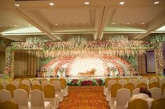 a banquet hall set up for a wedding