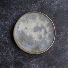 a dirty plate sitting on top of a table