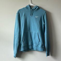 Brand New Never Worn Blue Nike Sweatshirt Blue Nike Hoodie For Loungewear, Nike Blue Hoodie For Loungewear, Light Blue Athleisure Top For Winter, Light Blue Sporty Sweatshirt For Sports, Light Blue Long Sleeve Sports Sweatshirt, Light Blue Casual Sweatshirt For Sports, Sporty Light Blue Tops With Ribbed Cuffs, Blue Athleisure Tops With Ribbed Cuffs, Nike Blue Sweatshirt Sportswear