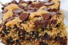 a close up of a plate of food with chocolate chip cookies on top of it