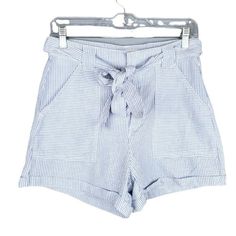 H&M L.O.G.G. Blue White Striped Tie-Waist Shorts With Pockets Casual Chic Size 6. - Zipper With Hook Closure. - Side Pockets. New With Tags. Measurements (Approximate Flat Lay): Waist: 13.5" Front Rise: 11" Inseam: 3.25" Striped High Waist Shorts With Pockets, High Waist Striped Shorts With Pockets, Striped High-waist Shorts With Pockets, High Rise Striped Shorts For Summer, High Rise Striped Summer Bottoms, Striped High-rise Summer Bottoms, Striped High Rise Bottoms For Summer, Summer High Waist Blue Shorts, H&m Bottoms With Pockets For Day Out