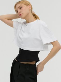 This double-layered t-shirt features sleeveless and short sleeved panels. It is accentuated with signature logo embroidery detail at chest.  - Natural, regular fit- Basic crewneck and short sleeved design- Unique layered panels at hem- Comfortable dropped shoulders- Casual, stylish mood White Short Sleeve Top For Layering, White Crew Neck Crop Top For Layering, Basic Crewneck, Layered Short, Layered T Shirt, Casual Stylish, Embroidery Details, Logo Embroidery, Signature Logo