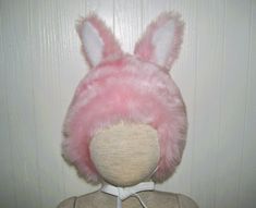 The bright and cheery pink bunny hat will fit 18.5-20" heads (toddler to 4 years old child)  Perfect gift for a boy or girl! This bubblegum pink bunny hat is so cute with nice stand-up ears and ties to keep it near.... It is offered for Halloween costuming or everyday wear, role play or dress up fun.   It has been developed from a vintage 60's patternI added some fun baby bunny earsall the better to hear you with, my dears!! ;0) And they stay standing at attention.  This is completely lined in soft cotton gingham, so it is light enough to wear for sprint or fall festivities. MORE HATS HERE  I have oodles of fun and one of a kind hats for costuming, winter and your pleasure!!  See them all here  https://www.etsy.com/shop/avantegarb?ref=seller-platform-mcnav&section_id=31237388 Each one of m Baby Bunny Hat, Vegan Halloween, Standing At Attention, Baby Rabbit, Bunny Hat, Fun Baby, Rose Bonbon, Pink Bunny, Baby Bunny