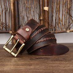 Enhance your style with the Raj leather belt for men. The braided central strap and roller buckle add a subtle elegance to your outfit. With a width of 3.8 cm, it provides a perfectly tailored look. Trust yourself and let this belt elevate your outfits. Formal Leather Rope Belt, Classic Leather Rope Belt, Brown Leather Rope Belt, Brown Belts And Suspenders With Antique Buckle For Business, Belts For Men, Buckle Jeans, Subtle Elegance, Designer Belt, Belt Purse