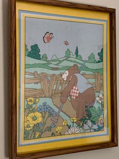 a painting on the wall with a bear and butterfly flying in the sky above it