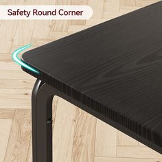 an image of a table with safety round corner on the top and green light at the edge