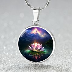 Discover our exquisite Lotus Flower Northern Lights jewelry line, a stunning tribute to the mesmerizing aurora borealis. It also prominently features the lotus flower; symbolizing strength, resilience, and rebirth, it's more than just jewelry--it's a profound statement of endurance and beauty. Perfect for nature enthusiasts, mothers, grandmothers, aunt, yoga enthusiast, spiritually aware friends, and more - this enchanting set makes for a truly meaningful and mesmerizing gift. Choose from your c White Spiritual Jewelry For Gifts, Spiritual Nickel-free Jewelry For Mother's Day, Spiritual Flower-shaped Jewelry Gift, Spiritual Flower Shaped Jewelry Gift, Spiritual Jewelry For Mother's Day, Spiritual Personalized Flower-shaped Jewelry, Spiritual Jewelry With Flower Charm For Her, Personalized Spiritual Flower Jewelry, Spiritual Round Pendant Jewelry For Mother's Day