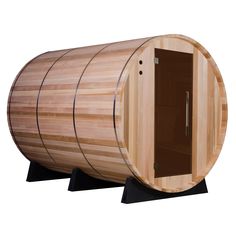 a large wooden barrel sauna with two shelves