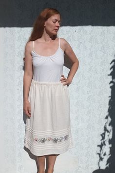 Unique 70s gauze skirt with hand embroidered flowers size M Length: 70 cm Waist : 40 cm (+ rubber adds more) Cotton gauze, unlined Condition Excellent condition. Spring Embroidered Beige Skirt, Floral Embroidered Full Skirt For Summer, Embroidered Cream Skirt For Summer, Summer Cream Embroidered Skirt, Vintage Floral Embroidered Bottoms For Summer, Summer Full Skirt With Floral Embroidery, Cream Floral Embroidery Bottoms For Summer, Summer Cream Bottoms With Floral Embroidery, Summer Floral Embroidery Cream Bottoms