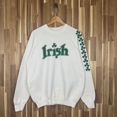 Vintage 90s University of Notre Dame Sweatshirt Jumper Notre Dame Crewneck Spell Outs Notre Dame Pullover Sweater Large Size White *50% Polyester *50% cotton *tag Fotl *Made in USA *Tag reads:   Size :  Large (check measurements below) *Manual size measurement  Width : 23.5" inches (armpit to armpit)                           Length : 28" inches  All measurements are taken with the garment flat on the ground. *Condition: have yellow stain (washable) very good condition check picture refer pictur Vintage Sweater With Letter Print And Long Sleeves, Vintage Long Sleeve Sweater With Letter Print, Retro White Sweater With Letter Print, White Retro Sweater With Letter Print, 90s Long Sleeve Sweater With Letter Print, White Retro Crew Neck Sweater, 90s Style White Crew Neck Sweater, White Crew Neck Sweater In 90s Style, 90s Style White Cotton Sweater