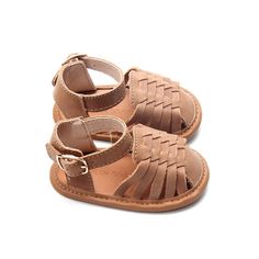 ***Looking for a larger size? Click HERE to see this same style with larger sizes in a hard sole.*** Introduce your little one to stylish comfort with our Camel Woven Sandals, available in US sizes 2-4. These adorable sandals are perfect for early walkers, combining a charming woven design with a soft sole for maximum comfort and flexibility. Crafted from genuine leather, they offer a delightful blend of style, quality, and ease of wear. Key Features: Adorable Design: The intricate woven pattern Spring Playtime Round Toe Sandals, Casual Round Toe Sandals For Spring Playtime, Brown Closed Toe Sandals With Soft Sole, Adjustable Flat Sandals With Rubber Sole, Flat Sandals With Adjustable Rubber Sole, Adjustable Sandals With Textured Sole And Round Toe, Spring Playtime Sandals With Rubber Sole, Synthetic Open Toe Sandals With Soft Sole, Open Toe Synthetic Sandals With Soft Sole