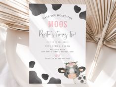 a card with a cow on it and the words moos written in black ink