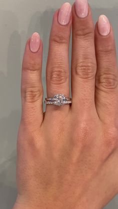 Our clients requested simplicity and beauty. Here they are in our Ariya: elegant, timeless and perfect, set with a cushion cut diamond. Approx Band Width (mm): 1.70mm Approx Production Time: 4-5 weeks Drop-down diamond options represent our recommended grade, which maximizes size for value, while maintaining eye-perfect clarity and giving you a colorless look. For other diamond options, see our Shop Diamonds tab or speak to one of our design consultants. This design can also be made with other s Cushion Wedding Ring Set, Wedding Band For Cushion Cut Ring, Silver Cushion Cut Engagement Ring, Square Cushion Cut Engagement Ring, Cushion Rings Engagement, Cushion Diamond Engagement Rings, Engagement Ring Styles Chart, Engagement Rings With Wedding Bands, Cushion Cut Wedding Set