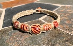 "*Please read below for sizing and item details* Hemp bracelet with wooden beads.  Made with natural hemp.  This bracelet is a 8\" fit and features five wooden beads on a square knot design. It finishes with a wooden bead and loop closure.  The hemp is 2mm thickness giving it a 3/8\" width.  *When measuring the fit of a bracelet/anklet be sure to measure your wrist/ankle. The size is determined by the inner circumference of the piece not the length of the item* *Please note that natural hemp jew Bead Macrame, Hippie Bracelet, Hemp Bracelet, Jewelry Hippie, Hemp Jewelry, Hemp Bracelets, Square Knot, Hippie Bracelets, Knot Design