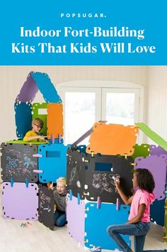 two children are playing in an indoor fort - building kit that kids will love