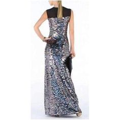 Go for glamorous evening appeal with this shimmering sequin-embellished gown. Round neck. Sleeveless. Allover sequin embellishment with mesh contrast at yoke. Button-closure keyhole at upper back. Sequined Mesh: Nylon, Spandex. Chiffon: Polyester. Dry Clean. Glamorous Fitted Maxi Dress With Contrast Sequin, Sleeveless Maxi Dress With Contrast Sequin For Night Out, Fitted Maxi Dress With Contrast Sequin For Holiday, Fitted Contrast Sequin Maxi Dress For Night Out, Fitted Maxi Dress With Contrast Sequin For Night Out, Glamorous Floor-length Contrast Sequin Fabric, Floor-length Sequin Evening Dress, Glamorous Floor-length Sequin Dress With Contrast Detail, Evening Dress With Contrast Sequin For Gala