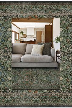 a living room filled with furniture and a rug