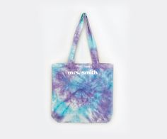 a purple and blue bag with the words mrs smith printed on it's side