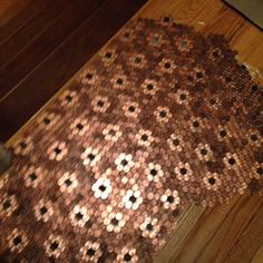 a close up of a tie on a wooden floor