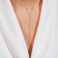 "18K Gold Filled Dainty Diamond Station Lariat Necklace, Dainty Diamond Link Y Necklace, Dainty Diamond Bezel Y Necklace, Lariat Y Necklace Gold Filled (Gold Filled - 1 micron 18 carat real gold Filled on 925 sterling silver) About Our Quality Joy of Jade has \"filled\" style, 18 carat-1 micron thick real gold plating layer (gold filled) that does not lose its sparkle and tarnish for a long time. It allows you to approach the feeling of real gold and the quality of jewellery craftsmanship at a much more affordable cost. ---Proccesing Order---- Orders placed by 16:00 Monday - Friday are processed and dispatched on the same working day. Delivery time: 2-3 working days after the order is processed and shipped. Return policy; Joy of Jade's top priority is customer satisfaction. You can return Fine Jewelry Lariat Necklace For Wedding, Fine Jewelry Lariat Necklace With Adjustable Chain For Wedding, Wedding Fine Jewelry Lariat Necklace With Adjustable Chain, Wedding Lariat Necklace With Adjustable Chain, Elegant Delicate Y-shape Chain Jewelry, Elegant Y-shape Delicate Chain Jewelry, Dainty Lariat Backdrop Necklace For Formal Occasions, Delicate Lariat Necklace With Clavicle Chain, Elegant Yellow Gold Lariat Necklace