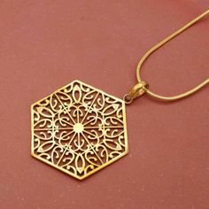 Product:- Pendant Material:- Brass Bohemian pendant,brass necklace, flower of life,boho necklace, flower of life amulet spiritual charm necklace,talisman protection, jewellery ❥ Customers' satisfaction is our biggest priority, please contact us with any questions/queries for future or existing orders, and we will do our best to make sure you are happy with your order. ❥Please make sure to add the correct address during checkout. You can return your purchased item within 15 days after successful Spiritual Medallion Necklace With Filigree Details, Spiritual Medallion Necklace With Filigree, Spiritual Filigree Medallion Necklace, Spiritual Medallion Filigree Necklace, Spiritual Filigree Flower Pendant Necklace, Spiritual Round Pendant Necklace With Filigree, Spiritual Necklace With Flower Pendant And Intricate Design, Brass Locket Necklace With Flower Pendant, Brass Flower Pendant Locket Necklace