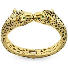 Bold and daring yet classic design from an international award-winning designer. Timeless and vibrant 18 karat gold and enamel bracelet is accented with stunning tsavorite eyes. Handmade in America.

Measures 2¾" x 2¼". Black Bangle, Leather Photo Albums, Lalique Crystal, Jewelry Bracelets Gold, Enamel Bangle, Silver Frames, Gold Monogram, Shell Bracelet, Enamel Bracelet