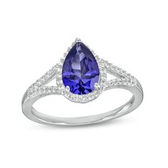 Bring royal color to any look when you wear this pear-shaped blue and white lab-created sapphire frame split shank ring in silver. Fashioned in sterling silver This choice glistens with a 9.0 x 6.0mm pear-shaped bright blue lab-created sapphire at the center. White lab-created sapphires line the halo frame and the ribbons of the split shank for added shimmer. Blue sapphire is the traditional birthstone for September and symbolizes truth, sincerity and commitment. Split Shank Ring, Royal Colors, White Lab, Silver Prices, Split Shank, Sapphire Stone, White Stone, Bright Blue, Pear Shaped