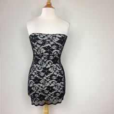 Nwot Brand New Y2k Black White Lace Strapless Mini Dress. Back Zipper Closure, Lined, Fitted. Night Out, Clubbing, Streetwear, Sexy. Missing Size Tag But Fits Like A Xs. See Measurements For Best Fit. Black Tube Top With Built-in Bra For Party, Black Backless Tube Top For Party, Y2k Sleeveless Mini Dress For Evening, Y2k Style Sleeveless Evening Mini Dress, Y2k Party Stretch Tube Top, Y2k Style Sleeveless Mini Dress For Evening, Y2k Bandeau Tube Top For Party, Party Black Tube Top With Built-in Bra, Y2k Fitted Tube Top For Parties