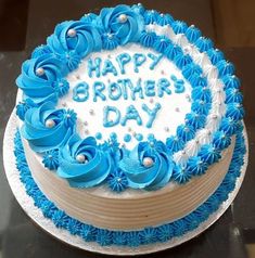 a blue and white birthday cake with the words happy brother's day written on it