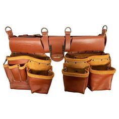 six brown leather bags sitting next to each other